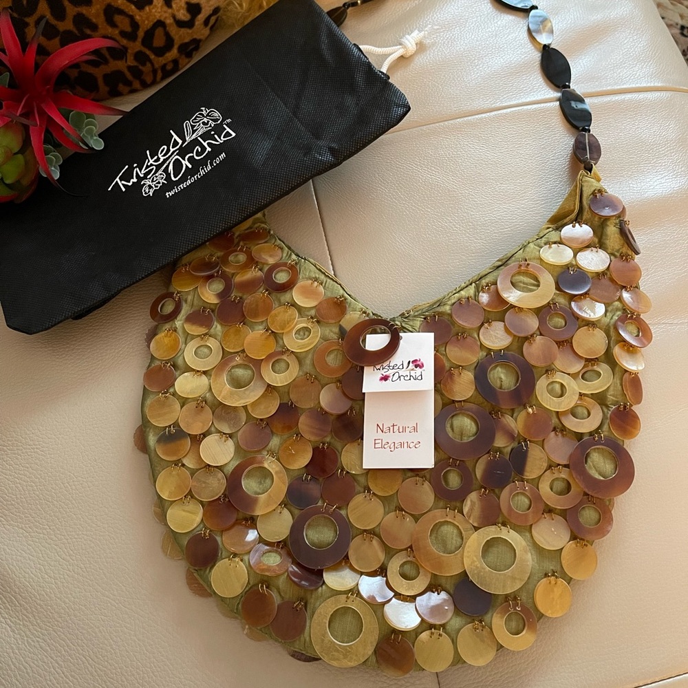 NWT Twisted Orchid horn handbag w/dust bag